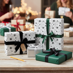 Elegant floral wrapping paper with black and green satin ribbons for a festive holiday gift exchange.