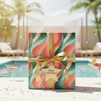 Modern celebration gift wrapped in abstract wave pattern paper with a gold ribbon and a pool party background.