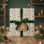 Festive Christmas gift with floral wrapping paper, green velvet ribbon, and "Happy Holidays!" tag.