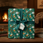 Elegant Christmas gift wrapped in green floral wrapping paper, accented with a satin ribbon and "Miami Christmas" tag.