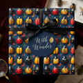 Square gift wrapped in blue beetle-patterned wrapping paper from Wrapped Studios, tied with black ribbon.