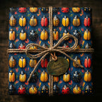 Wrapped gift in colorful beetle-patterned wrapping paper, tied with rustic twine. "Just Because" tag.