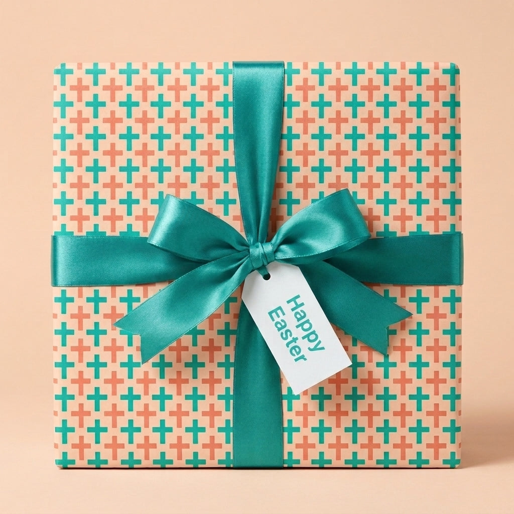 Easter wrapping paper with modern teal geometric pattern, satin bow, and Happy Easter tag by Wrapped Studios.
