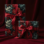 Elegant gifts wrapped in dark floral wrapping paper with red satin bows.
