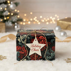 Elegant floral Christmas gift wrap with a gold string bow and "Holiday Cheer" star tag on a soft, textured surface.