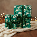 Emerald green Christmas gift wrap with white poinsettia flowers and velvet ribbon.