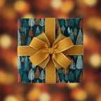 Teal Christmas gift wrap with gold ribbon and tree pattern.