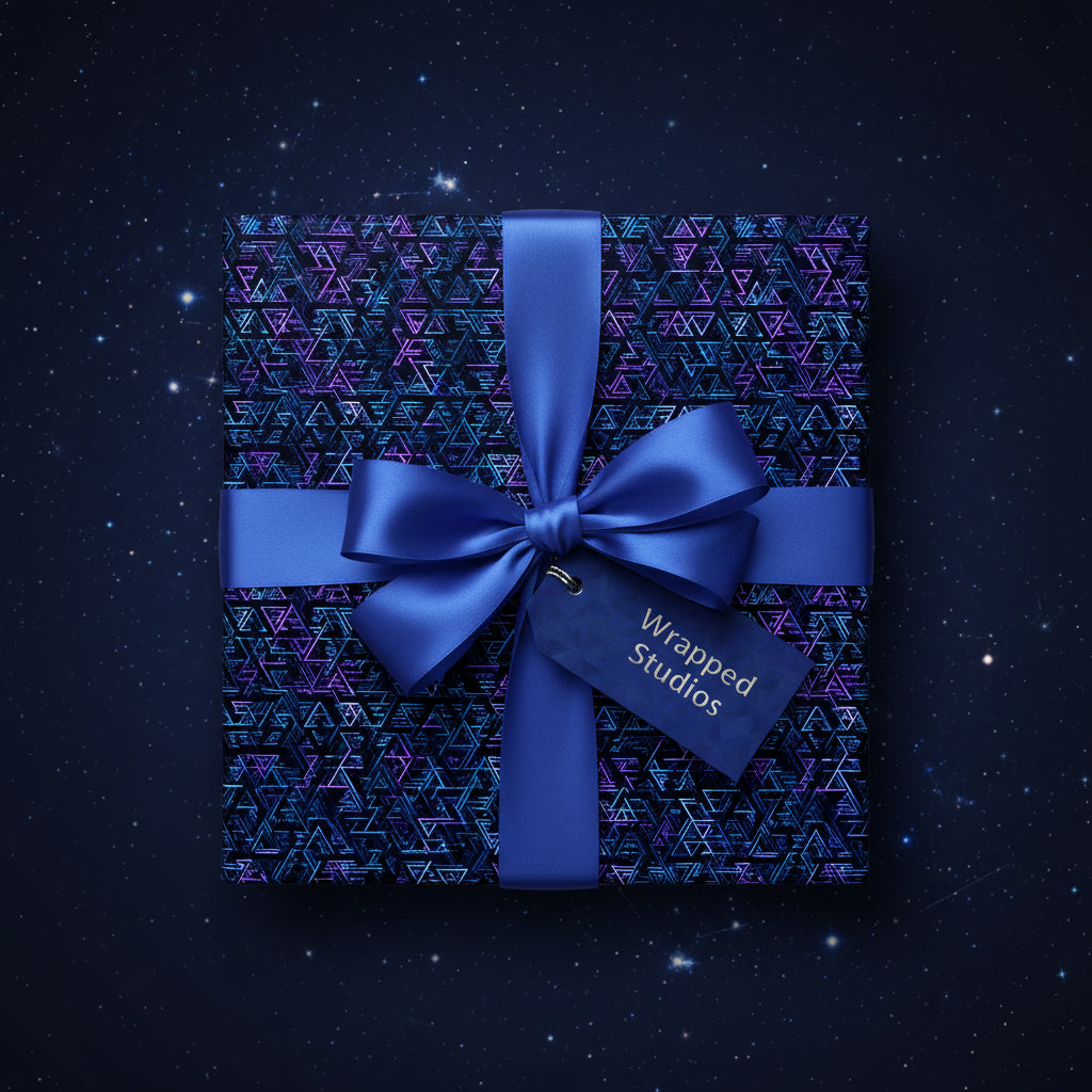 Navy blue gift with modern geometric wrapping paper, satin bow, and tag on starry background.