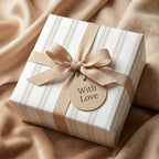 Minimalist beige striped wrapping paper with a bow and "With Love" tag by Wrapped Studios.