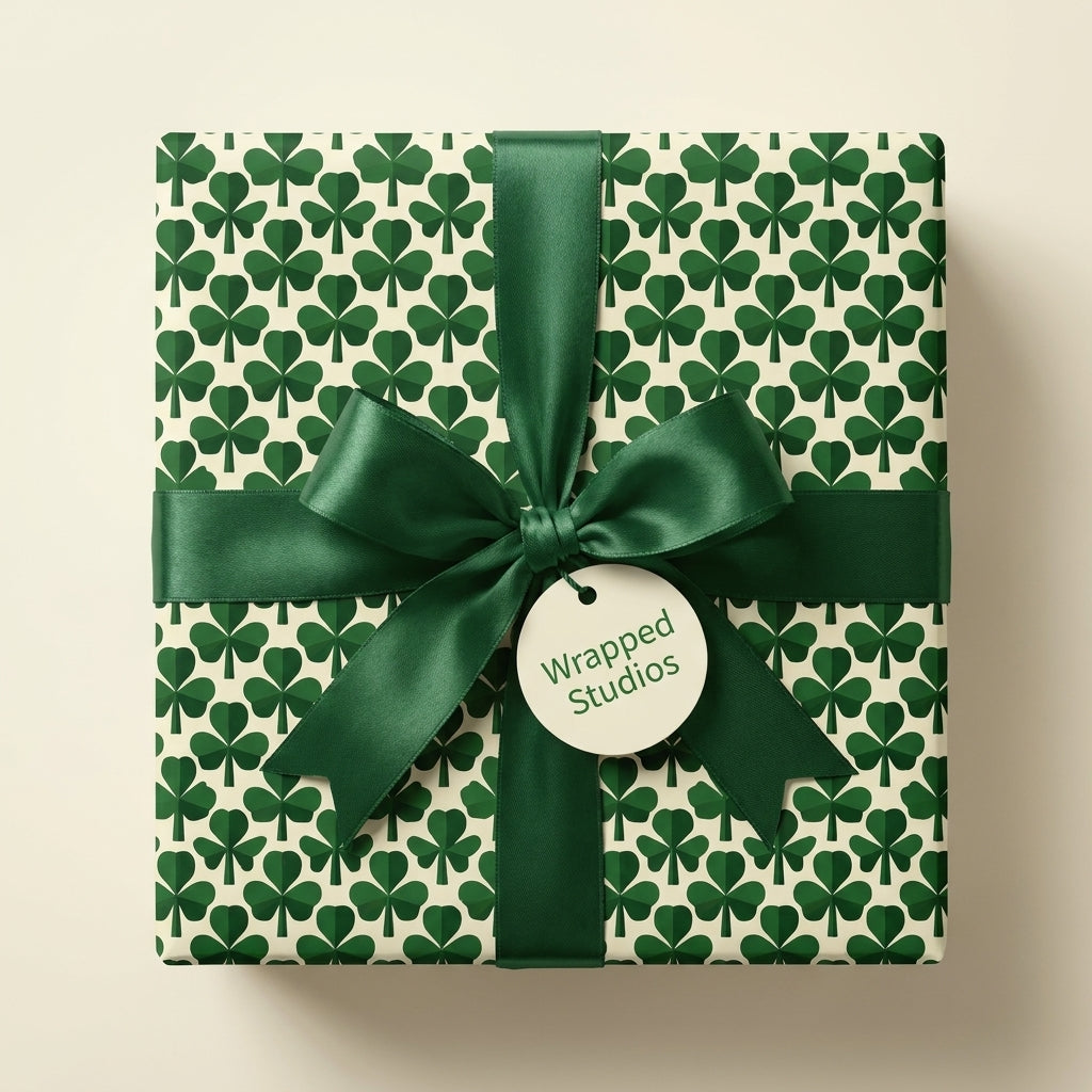 Shamrock wrapping paper with green satin bow by Wrapped Studios, ideal for St. Patrick’s Day.