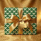 St. Patrick's Day shamrock wrapping paper with elegant gold ribbon by Wrapped Studios.