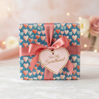 Gift wrapped in heart print wrapping paper with pink ribbon and "For My Sweetheart" tag.