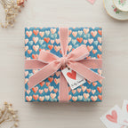 Gift wrapped in heart-patterned wrapping paper with a pink velvet ribbon and a "To My Dearest" tag.