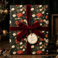 Luxury vintage floral wrapping paper with a burgundy velvet bow and gift tag, by Wrapped Studios.