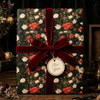 Luxury vintage floral wrapping paper with a burgundy velvet bow and gift tag, by Wrapped Studios.