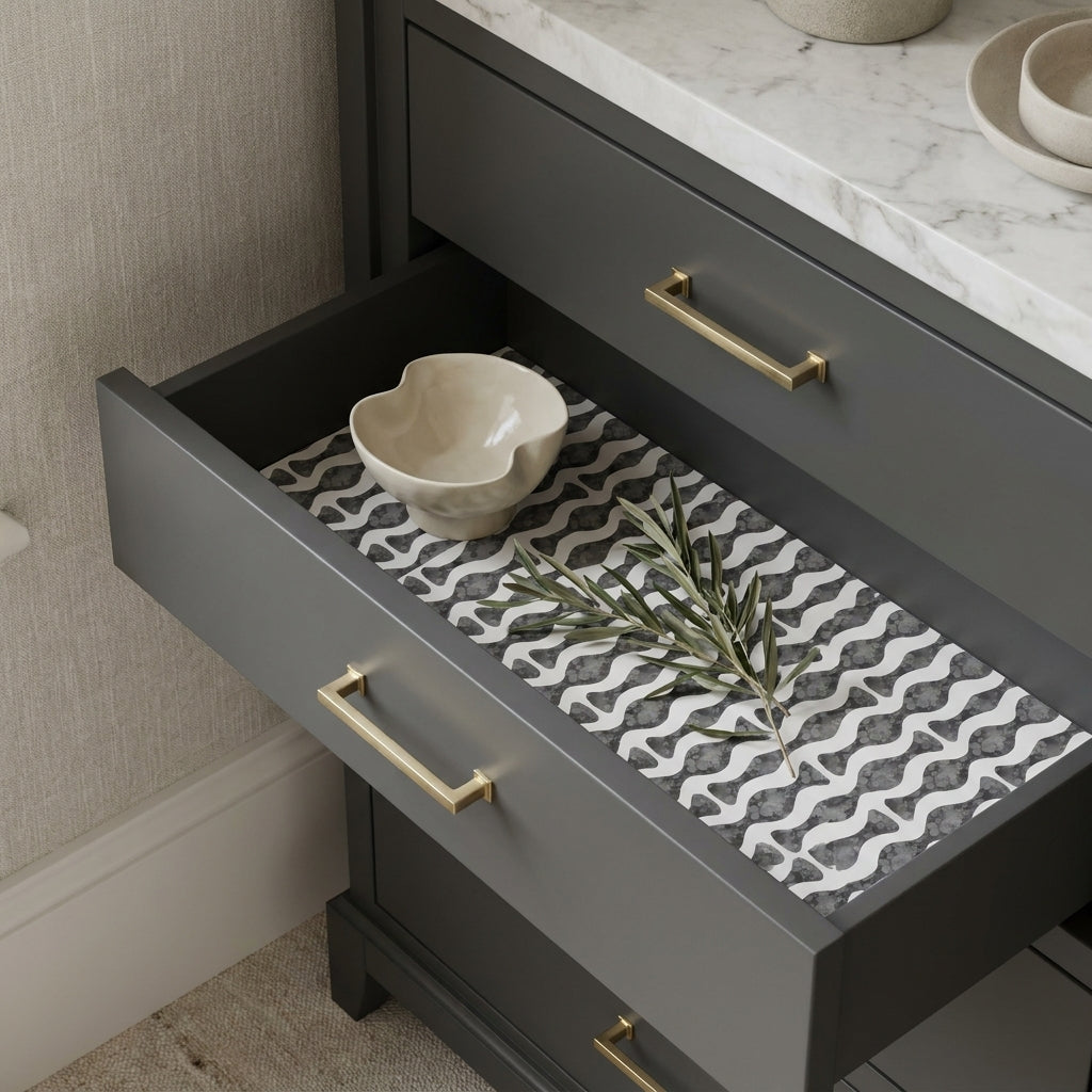 Modern black and white wavy wrapping paper used as luxury drawer liner by Wrapped Studios.