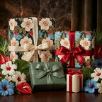 Luxury dark floral wrapping paper and sage green gift wrap with elegant bows by Wrapped Studios.