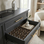Dark floral wrapping paper by Wrapped Studios lining a modern grey dresser drawer.