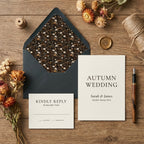 Rustic autumn wedding invitation with dark floral envelope liner and dried flowers by Wrapped Studios.