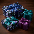 Luxury dark floral wrapping paper on elegant gift boxes with satin bows by Wrapped Studios.