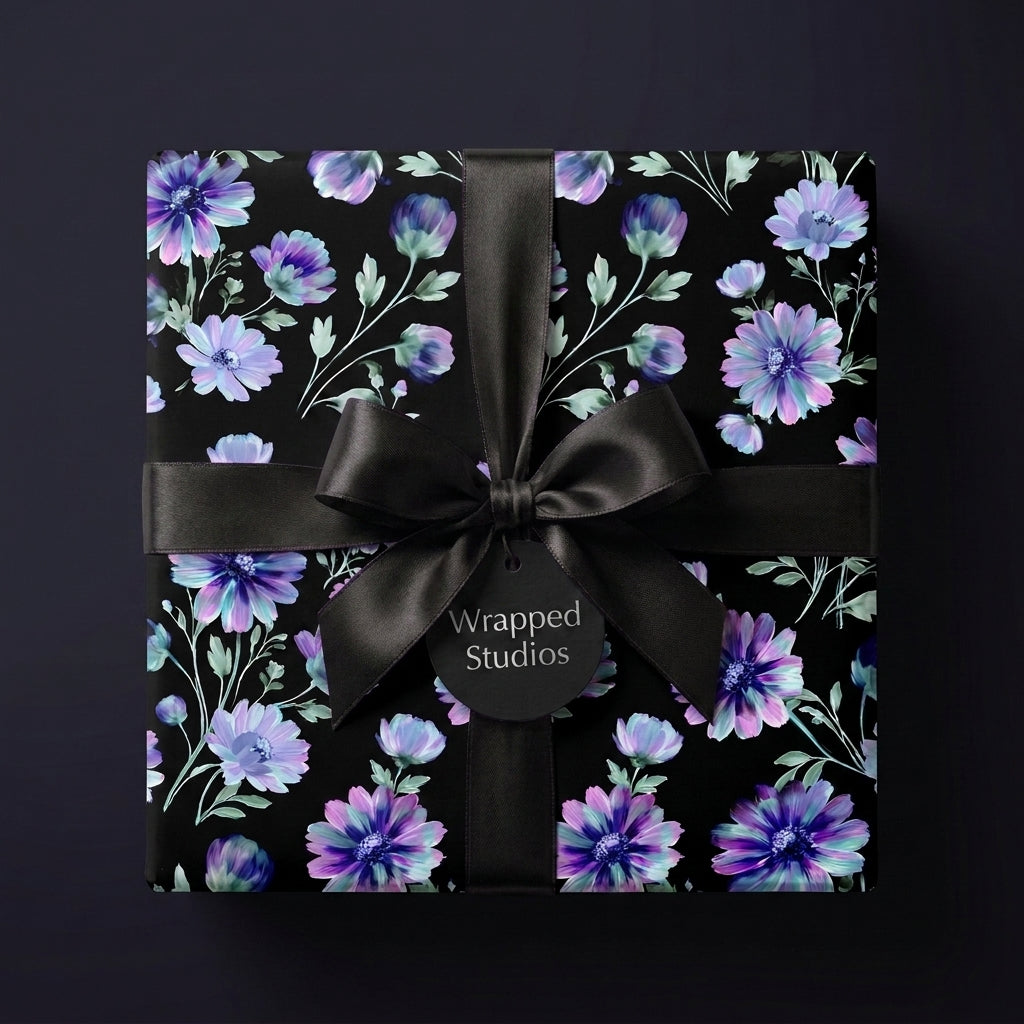 Luxury dark floral wrapping paper with purple flowers and a satin bow, by Wrapped Studios.