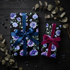 Luxury dark floral wrapping paper with purple flowers and ribbons by Wrapped Studios.