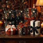 Moody floral wrapping paper on luxury gift boxes with velvet bows by Wrapped Studios.