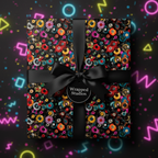 Retro vinyl record wrapping paper with black satin ribbon; fun birthday gift wrap.