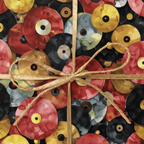 Vintage vinyl record wrapping paper with twine bow for music lover gifts.