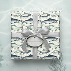 Gift wrapped in novelty fish wrapping paper with a silver ribbon and a "From the Deep" tag.