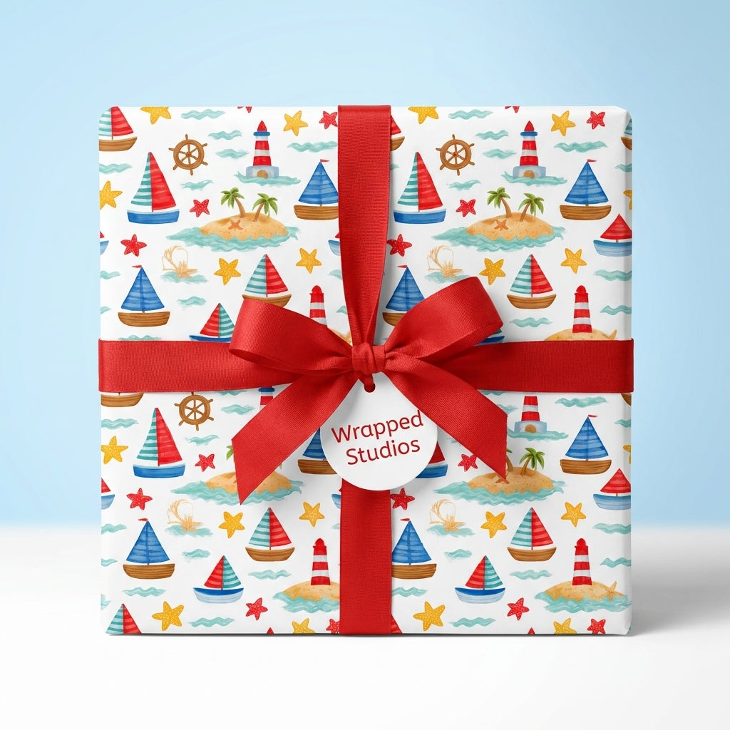 Nautical sailboat wrapping paper with a red bow and Wrapped Studios tag, ideal for kids birthday or baby shower.