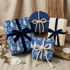 Nautical wrapping paper and coastal gift wrap with velvet and rope ribbons by Wrapped Studios.