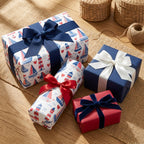 Nautical sailboat wrapping paper and gift wrap with navy and red ribbons by Wrapped Studios.