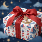 Nautical baby shower wrapping paper with sailboats and lighthouses, red ribbon by Wrapped Studios.
