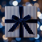 Luxury navy blue striped wrapping paper with a velvet bow, perfect holiday gift wrap by Wrapped Studios.