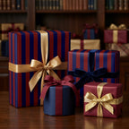 Luxury navy and burgundy striped wrapping paper with gold bows by Wrapped Studios.