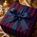 Elegant navy and red striped wrapping paper with blue ribbon bow, luxury holiday gift wrap by Wrapped Studios.