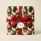 Vintage Santa Christmas wrapping paper with a red bow on a gift box, from Wrapped Studios.