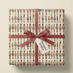 Nutcracker Christmas gift wrap with a muted red ribbon and tag.