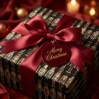 Elegant square gift box wrapped in nutcracker Christmas wrapping paper with a red satin bow.