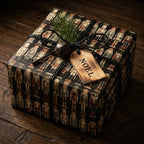 Elegant Christmas gift wrapped in vintage nutcracker wrapping paper with twine, bell, and Noel tag.
