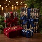 Luxury nutcracker Christmas wrapping paper with elegant velvet and satin bows by Wrapped Studios.
