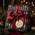Nutcracker Christmas wrapping paper with red satin bow and Merry Christmas tag by Wrapped Studios.