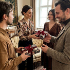 Friends exchanging holiday gifts in luxury vintage floral wrapping paper by Wrapped Studios.