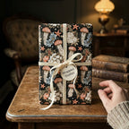 Luxury ocean wrapping paper with a vintage jellyfish pattern and cream velvet ribbon by Wrapped Studios.