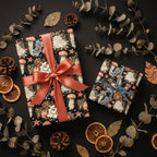 Luxury ocean floral wrapping paper with jellyfish and starfish on gift boxes by Wrapped Studios.