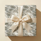 Luxury water ripple wrapping paper with a cream satin ribbon by Wrapped Studios.