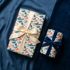 Japanese ocean wave gift wrap by Wrapped Studios with luxury cream satin and blue velvet bows.