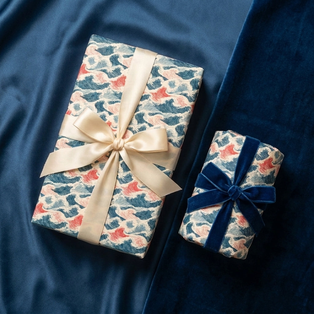 Japanese ocean wave gift wrap by Wrapped Studios with luxury cream satin and blue velvet bows.