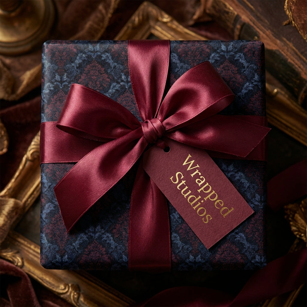 Elegant damask gift wrapped with burgundy ribbon & tag, perfect for luxury gift wrap.